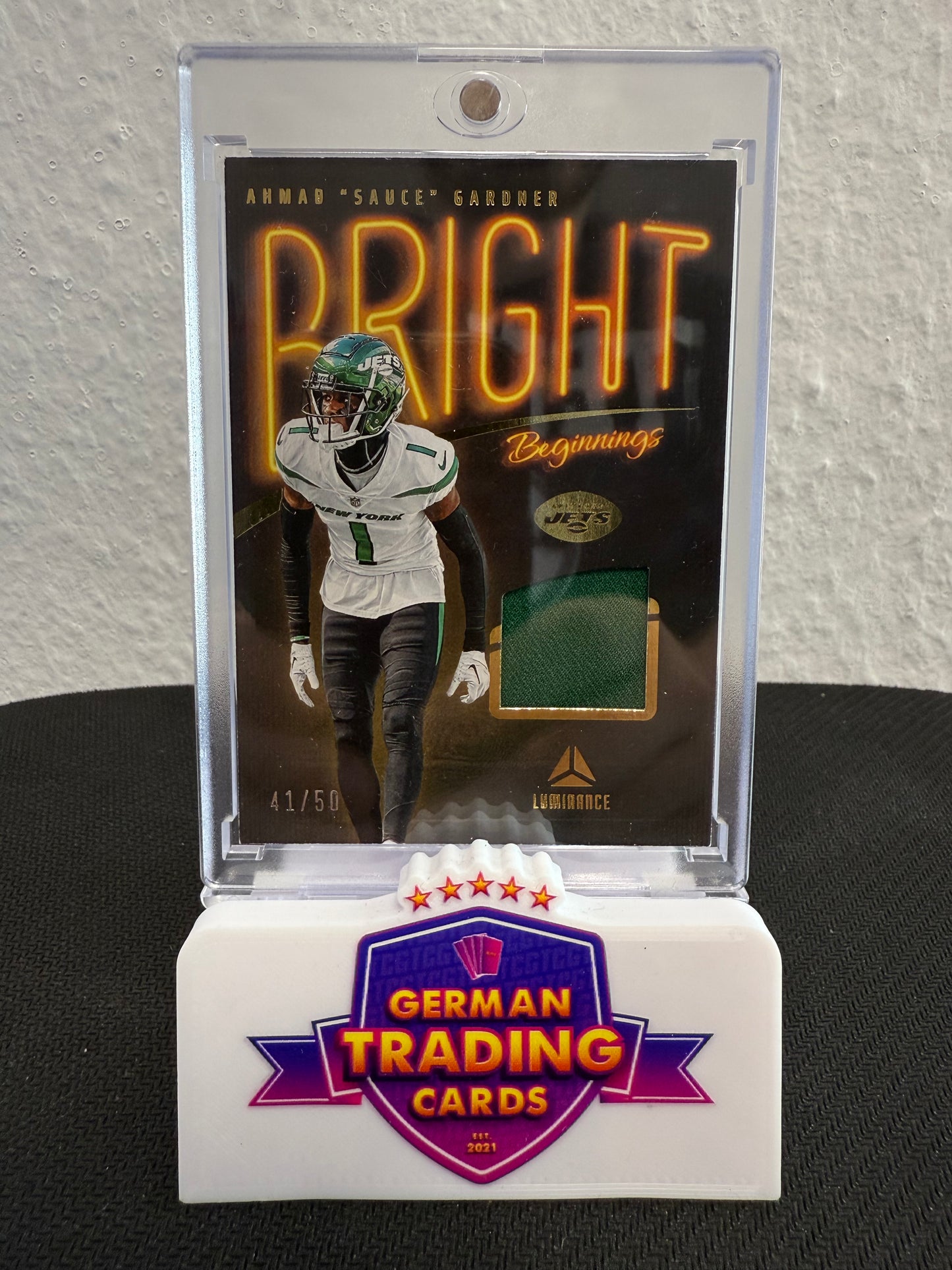 Ahman "Sauce" Gardner Bright Jersey 41/50 - 2023 Panini Luminance Football